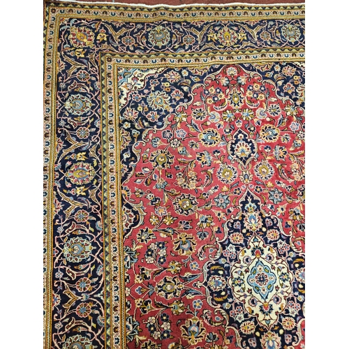 625 - A fine handwoven full pile Persian Kashan Carpet with a traditional Kashan floral design.
202 x 302 ... 