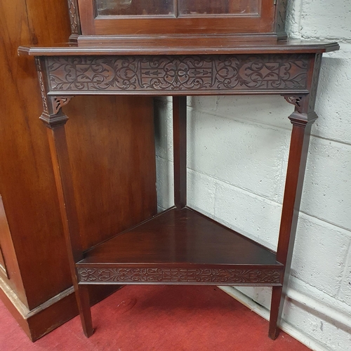 651 - An Edwardian Mahogany and Inlaid Corner Cabinet  with fretwork detail and architectural pediment top... 