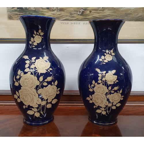 696 - A grouped lot to consist of A pair of Oriental blue ground Vases. H 36 cm approx., A print of a lady... 