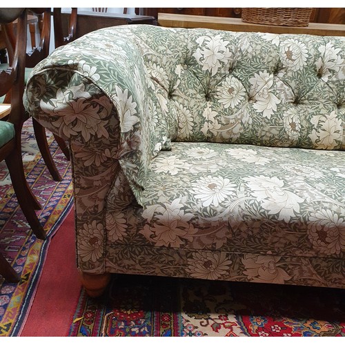 605 - A good deep buttoned Chesterfield Couch with William Morris Fabric, with two arm savers.
L 200 x W 9... 