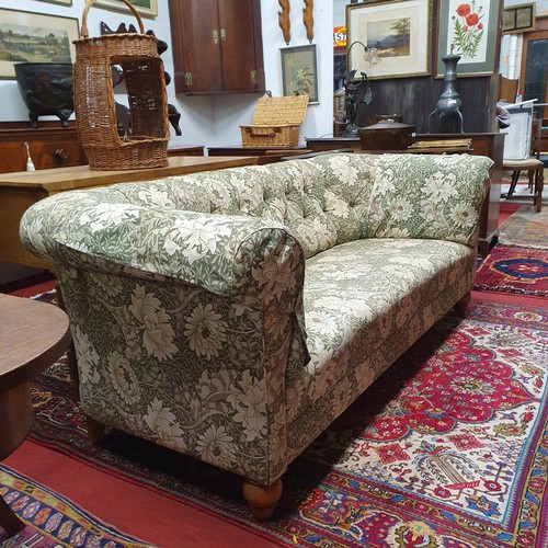 605 - A good deep buttoned Chesterfield Couch with William Morris Fabric, with two arm savers.
L 200 x W 9... 