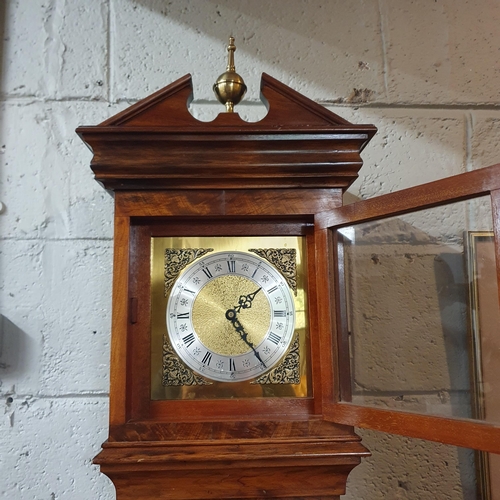 58 - A reproduction Mahogany Grandmother Clock with Steel and Brass style architectural and pediment top.... 