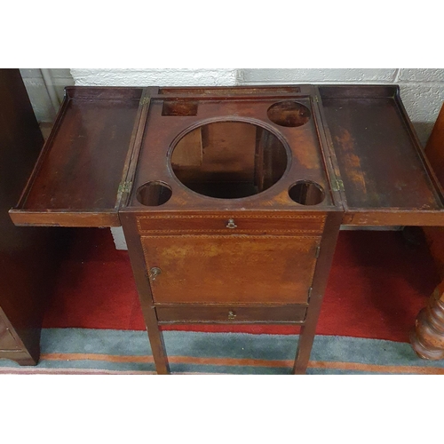 172 - An early Regency Mahogany Gentleman's Washstand with lift up lid and single panel drawer on square s... 