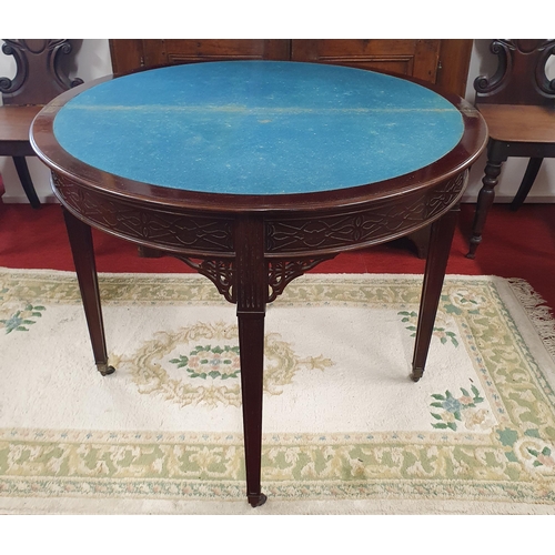 404 - A late 19th Century Mahogany half moon foldover Card Table with fretwork frieze and details on squar... 