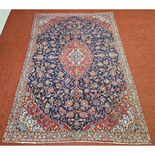 517 - A unique Blue ground handwoven Persian Kashan Carpet with a traditional floral Kashan design.
317 x ... 