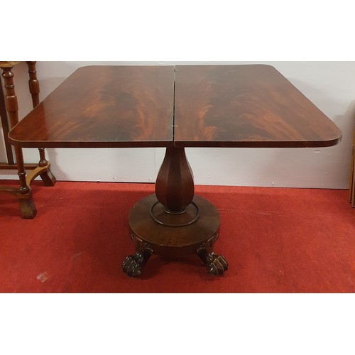 580 - A 19th Century Mahogany fold over Card Table, probably Irish with hairy paw platform base.
W 90 x D ... 