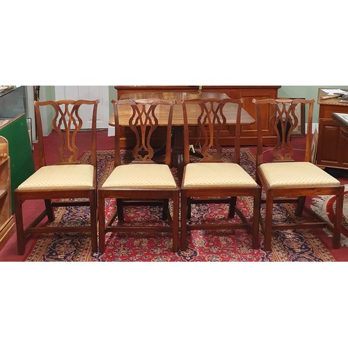 628 - A really good set of four heavy 19th Century dining Chairs with pierced backs on square tapered supp... 