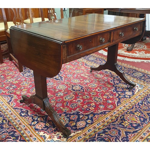 657 - A Superb 19th Century Rosewood Sofa Table of neat proportions with twin frieze drawers on splayed su... 