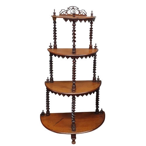 433 - A 19th Century Mahogany four tier half moon demi loon Whatnot with pierced outline and barley twists... 