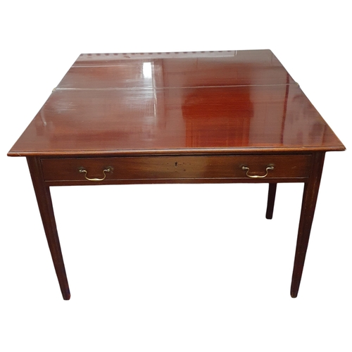 442 - A good Georgian Mahogany fold over Tea Table with single frieze drawers on square tapered fluted sup... 