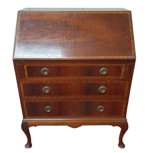 446 - An Edwardian Mahogany and inlaid Bureau of neat proportions on cabriolet front supports. W 76 x D 46... 