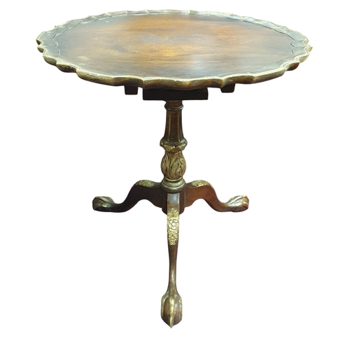 450 - A Mahogany scalloped edged Lamp Table, on carved tripod supports. 
59 x 64 cm approx.