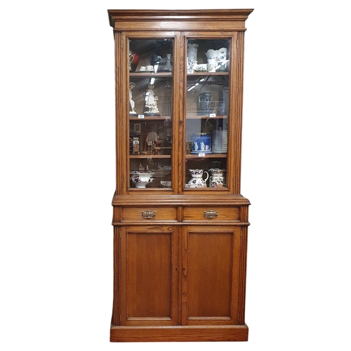 460 - A 19th Century Oak two door Bookcase of good quality and proportions with glazed upper section with ... 
