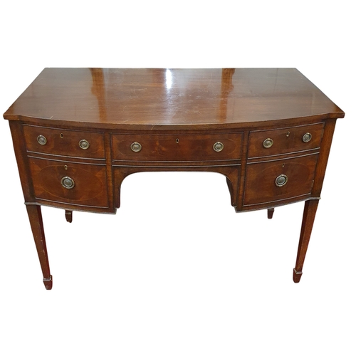 466 - A late 19th early 20th Century bow fronted Sideboard of neat proportions with square tapered support... 