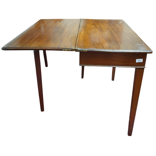 434 - Of superb quality  A Georgian Mahogany foldover Tea Table with square tapered supports. 90 x 44 x 76... 