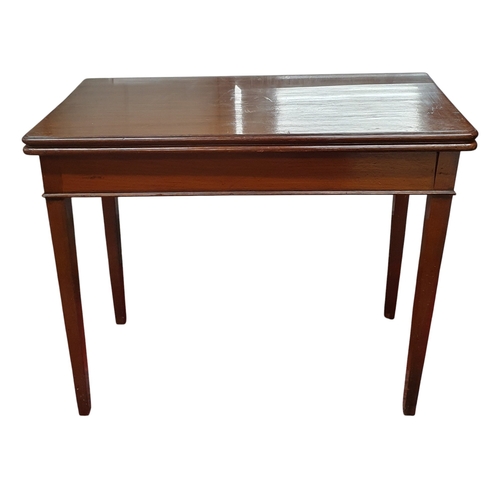 434 - Of superb quality  A Georgian Mahogany foldover Tea Table with square tapered supports. 90 x 44 x 76... 