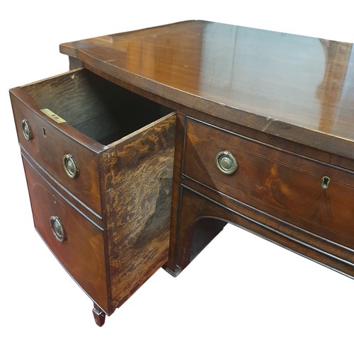 466 - A late 19th early 20th Century bow fronted Sideboard of neat proportions with square tapered support... 