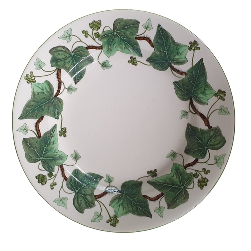 73 - A good quantity of Wedgwood Napoleon Ivy pattern Dinnerwares on three shelves.
