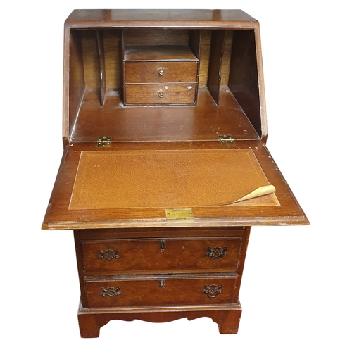 109 - A 20th Century Walnut Bureau of very neat form. W 53 x D 41 x H 98 cm approx.