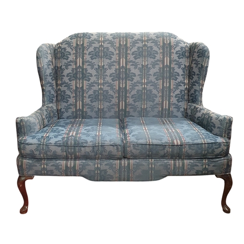 630 - A  20th Century wingback two seater Couch on simple cabriole supports. W 143 x SH 50 x BH 113 cm app... 