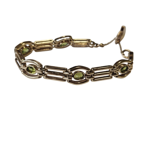 347 - A beautiful 9ct Gold and Peridot Bracelet, total weight 25 grams approx.