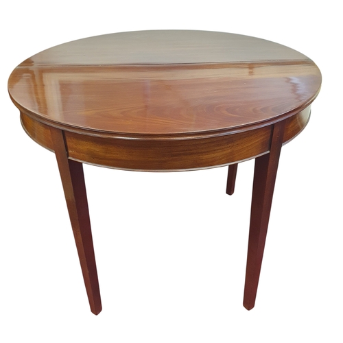 29 - A Regency Mahogany foldover Tea Table of superb quality with square tapered supports.
H 75 x 94 x 47... 