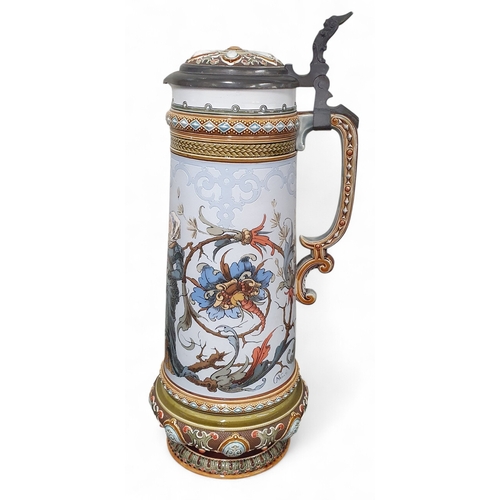 38 - Two extremely large German Steins with highly embossed detail. One is a Gilleroy and Boch and the ot... 