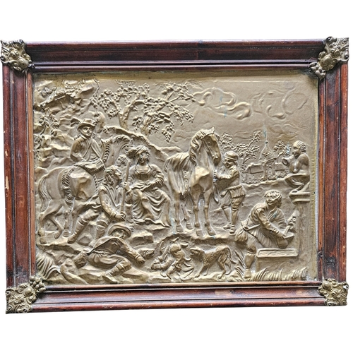 4 - A 19th Century pressed Brass framed Panel depicting Huntsmen and Hounds in an original frame with br... 