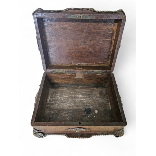 47 - A 19th Century Oak Box with brass mounts. 25 x 19 x H 11 cm approx.