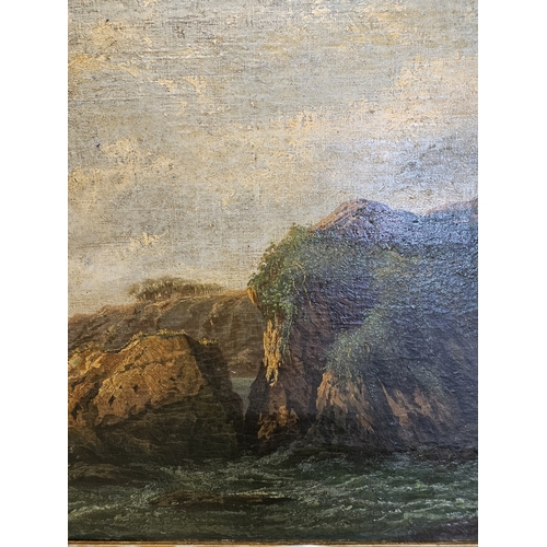 414 - A 19th Century Oil on Canvas of a rocky coastal scene Landscape with ship in the distance. In a gold... 