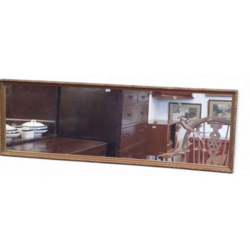 108 - A 20th Century etched glass rectangular Mirror. 94 x 30 cm approx.