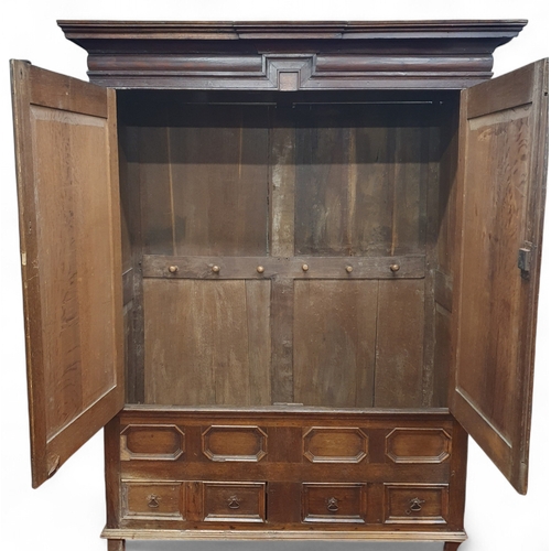 122 - An extremely large 19th Century, possibly earlier, Oak Court Cupboard with arch top panel doors.
160... 
