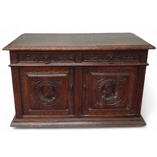 129 - A superb early 19th, possibly 18th Century, Oak two door Side Cabinet with twin frieze drawers and p... 