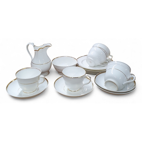 49 - A Crown Chinaware Teaset in the pink rose floral pattern along with a Duchess Ascot pattern teaset a... 