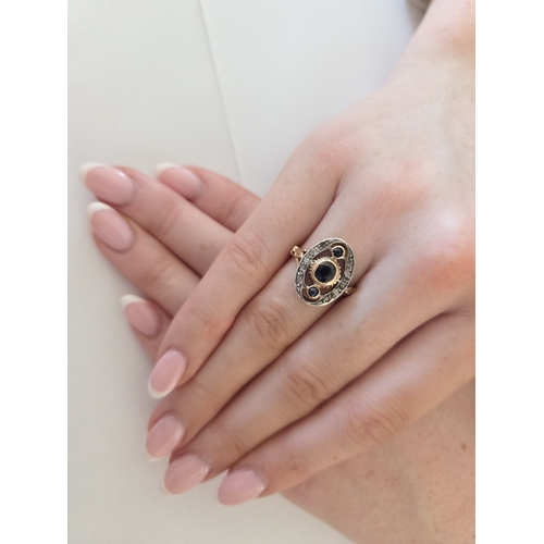 A lovely 18ct Gold, Diamond and Sapphire oval cluster Ring in the Art Deco style, size M. Very suitable for any age person.