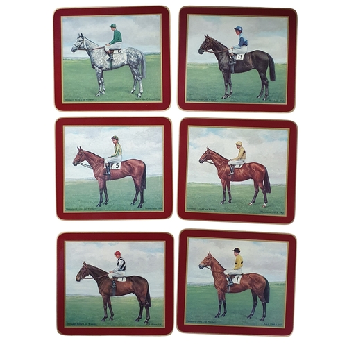19 - A set of six Hennessy Gold Cup winner's place mats along with a centre place mat.
6 x 22 x 19 1/2 cm... 