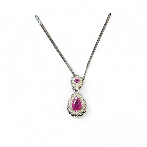 354 - An 18ct Gold, Diamond and Ruby Pendant and 18ct Gold chain.