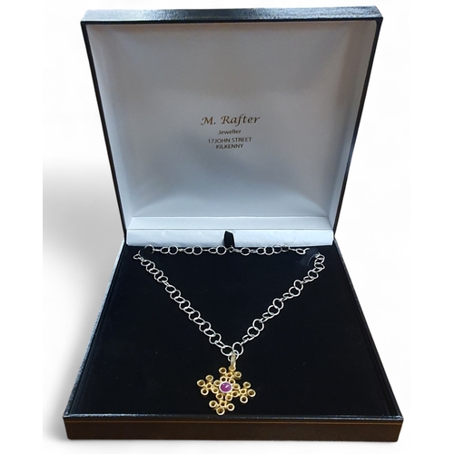 380 - A Silver Gold plated and natural Ruby Necklace.