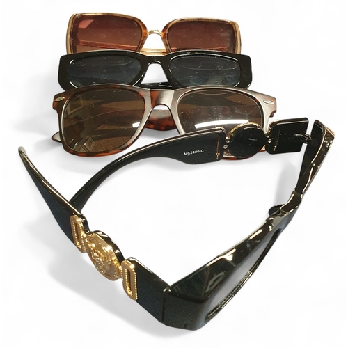 383 - A quantity of fashion Jewellery along with a group of Sunglasses.