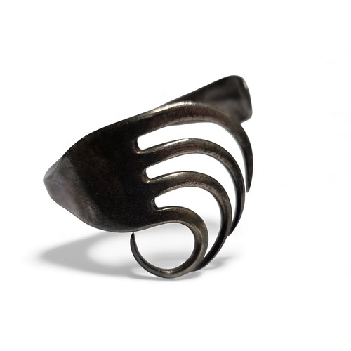 385 - A very unusual London Silver Bangle made from a fork