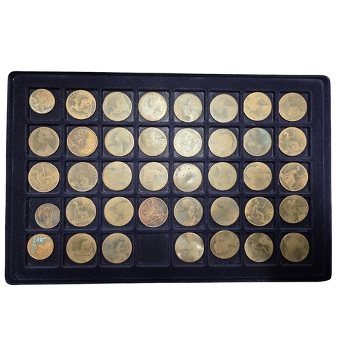 386 - An extremely large quantity of primarily British Pennies, some Irish. In a metal coin case.