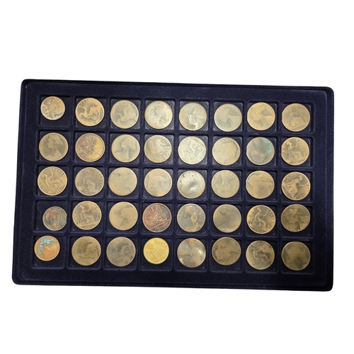386 - An extremely large quantity of primarily British Pennies, some Irish. In a metal coin case.