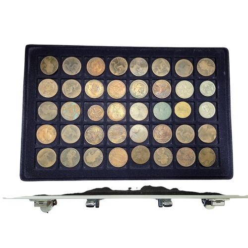 387 - An extremely large quantity of Irish Pennies and other coins. In a metal coin case.