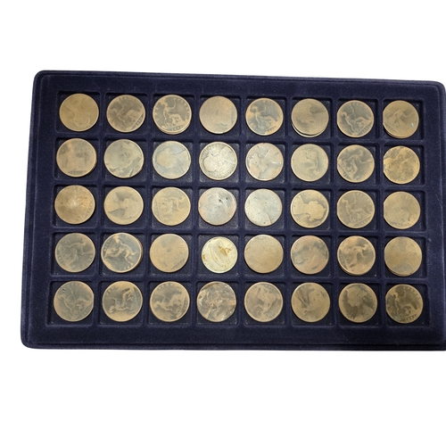 389 - An extremely large quantity of primarily British Pennies some Irish. In a metal coin case.