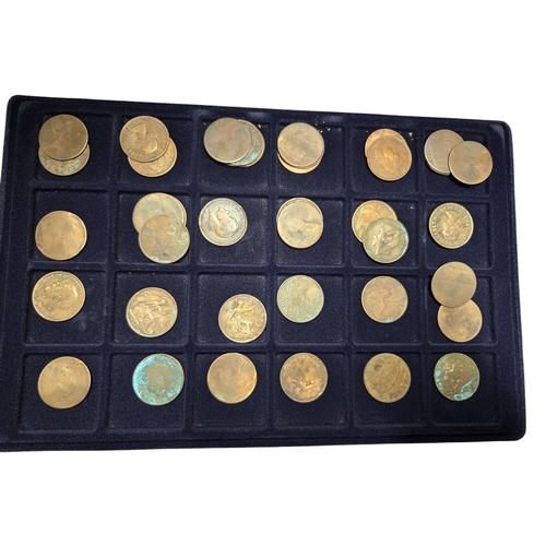389 - An extremely large quantity of primarily British Pennies some Irish. In a metal coin case.