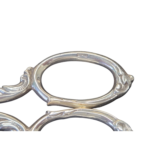 389A - A Silver handled Scissors, set of five Silver spoons, a Harrods lidded serving dish along with a cir... 