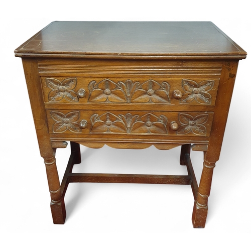451 - A 19th Century Oak two drawer Side Cabinet on turned supports.  W 64 x D 42 x H 72 cm approx.