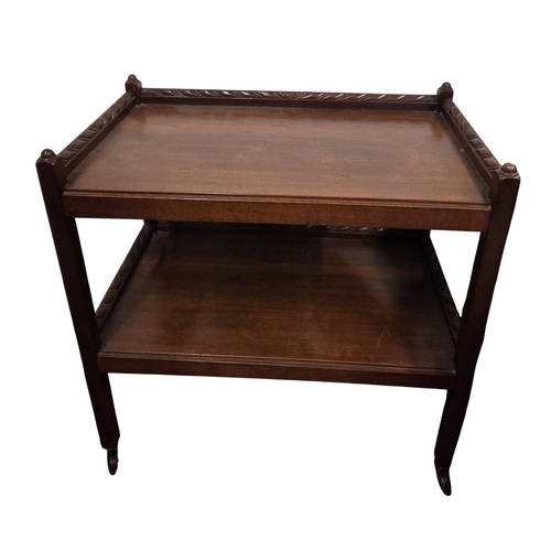 468 - An early 20th Century Mahogany miniature Dumbwaiter along with an Edwardian Piano Stool and a circul... 