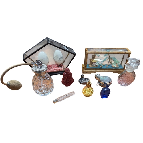 492 - A quantity of Scent Bottles, Dioramas etc.