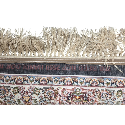 493 - An allover floral pattern deep ground fine woven Iranian Runner.